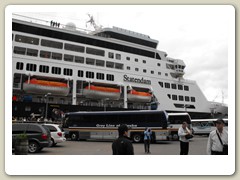 Our ship is docked and passengers departing